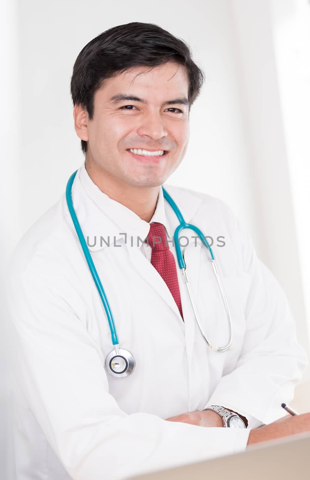 A portrait of a doctor man with smiling and happiness at the hospital.