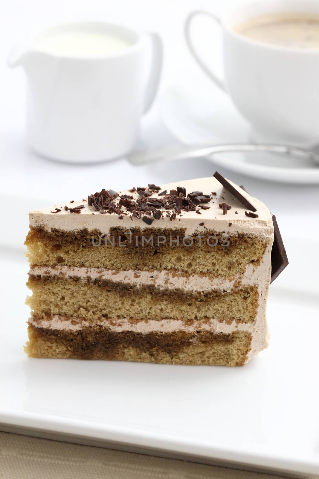 Coffee cake in white background by piyato