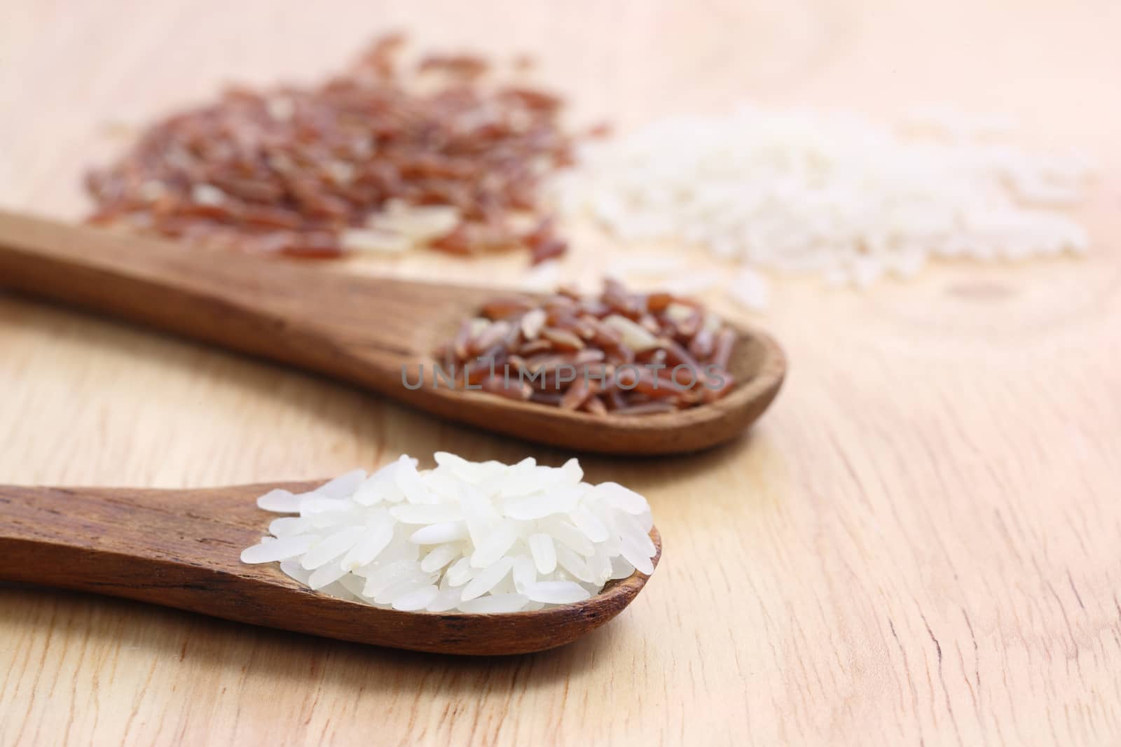Rice with wood background by piyato