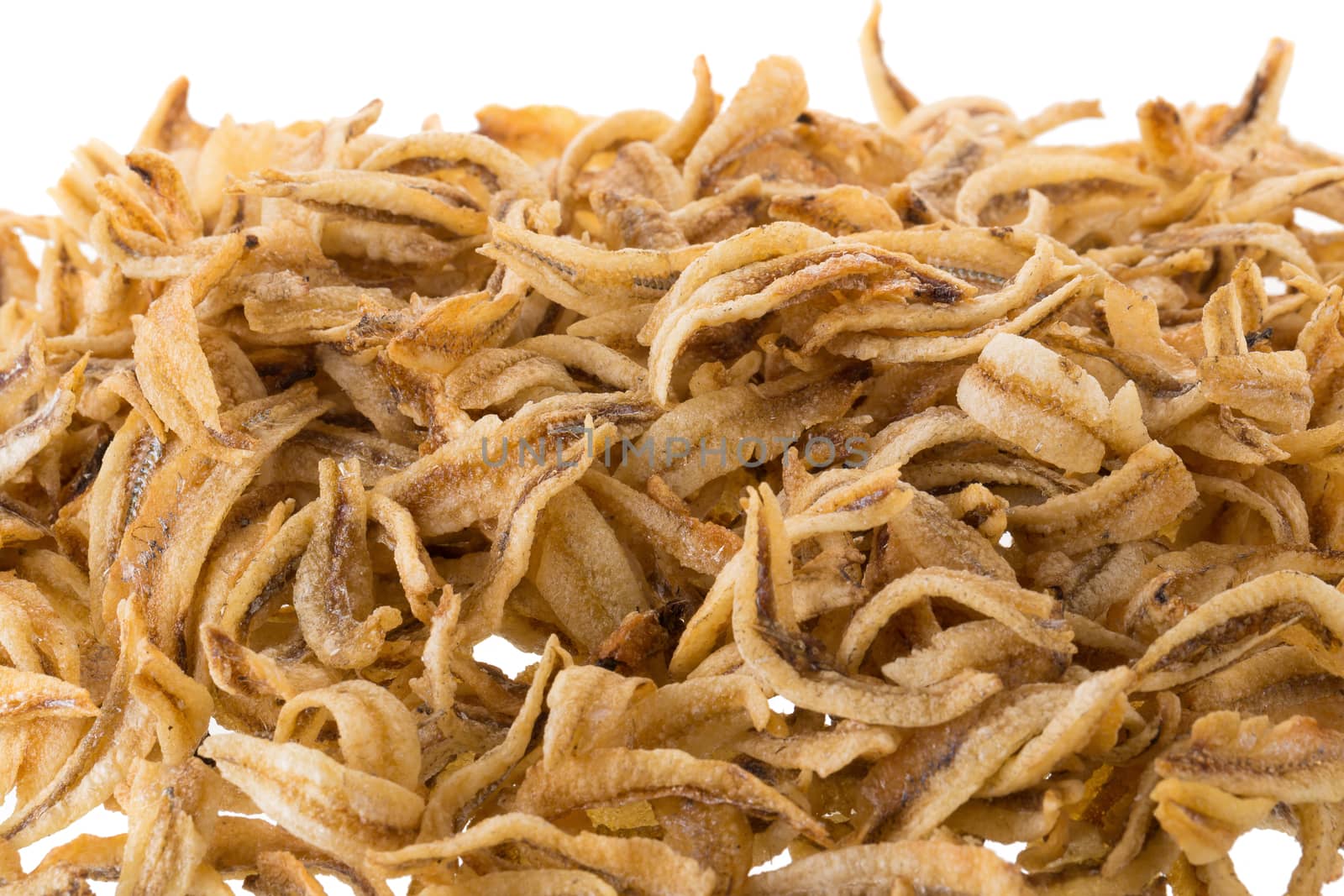 Dried Small fish anchovies and crispy Seafood isolated on white  by kaiskynet