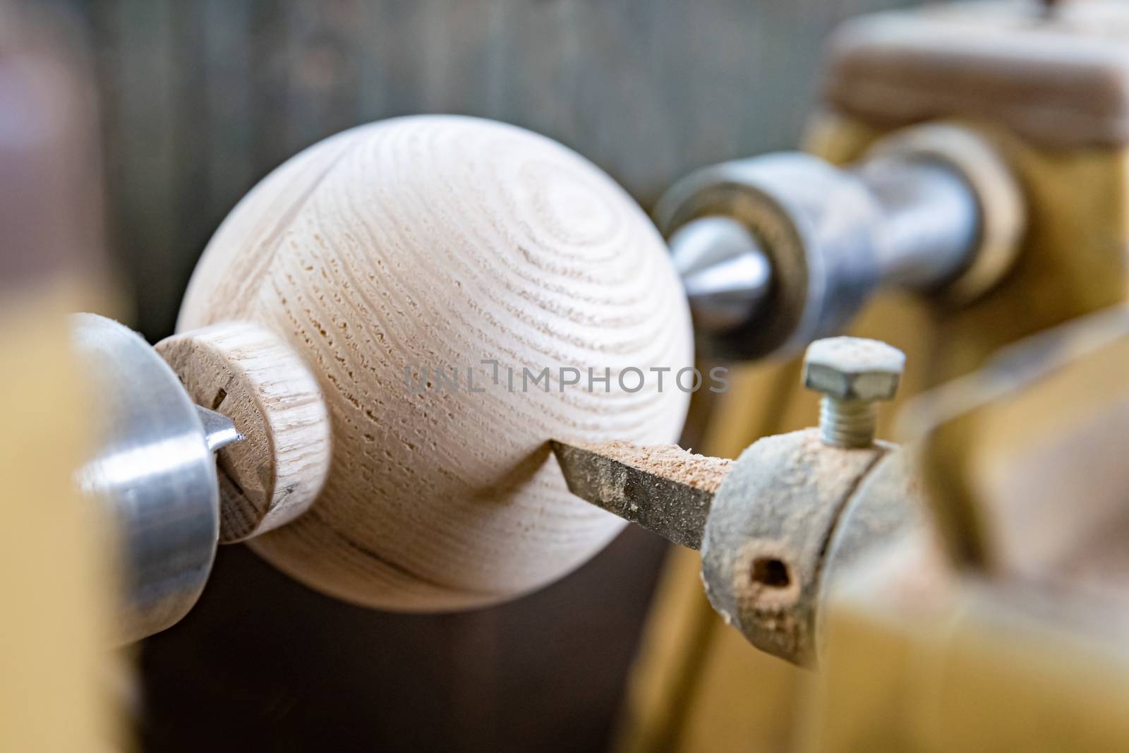 manufacture round wooden handles on lathe in joinery by Edophoto