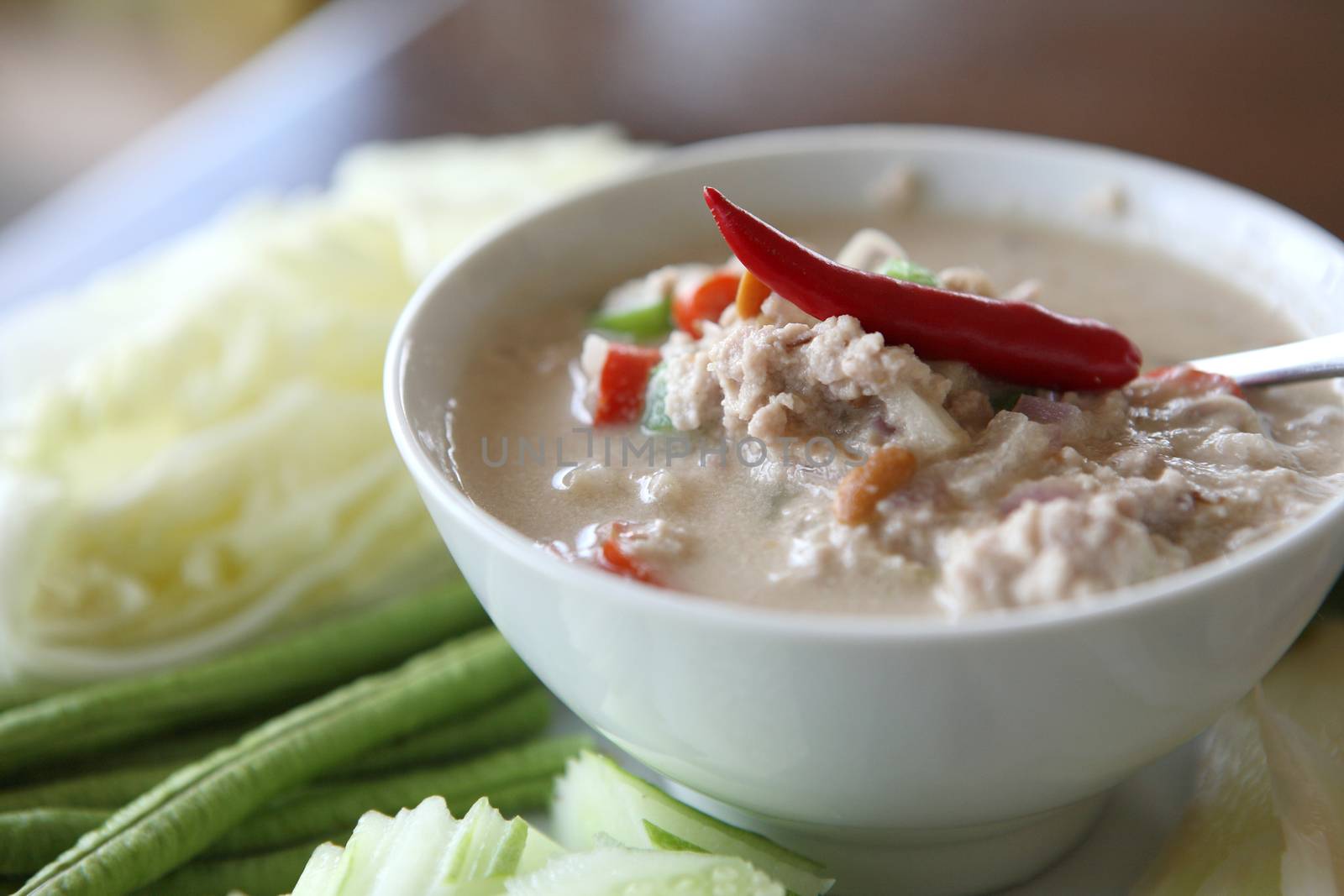  Thai food soya bean dipping sauce in pork with vegetable on woo by piyato