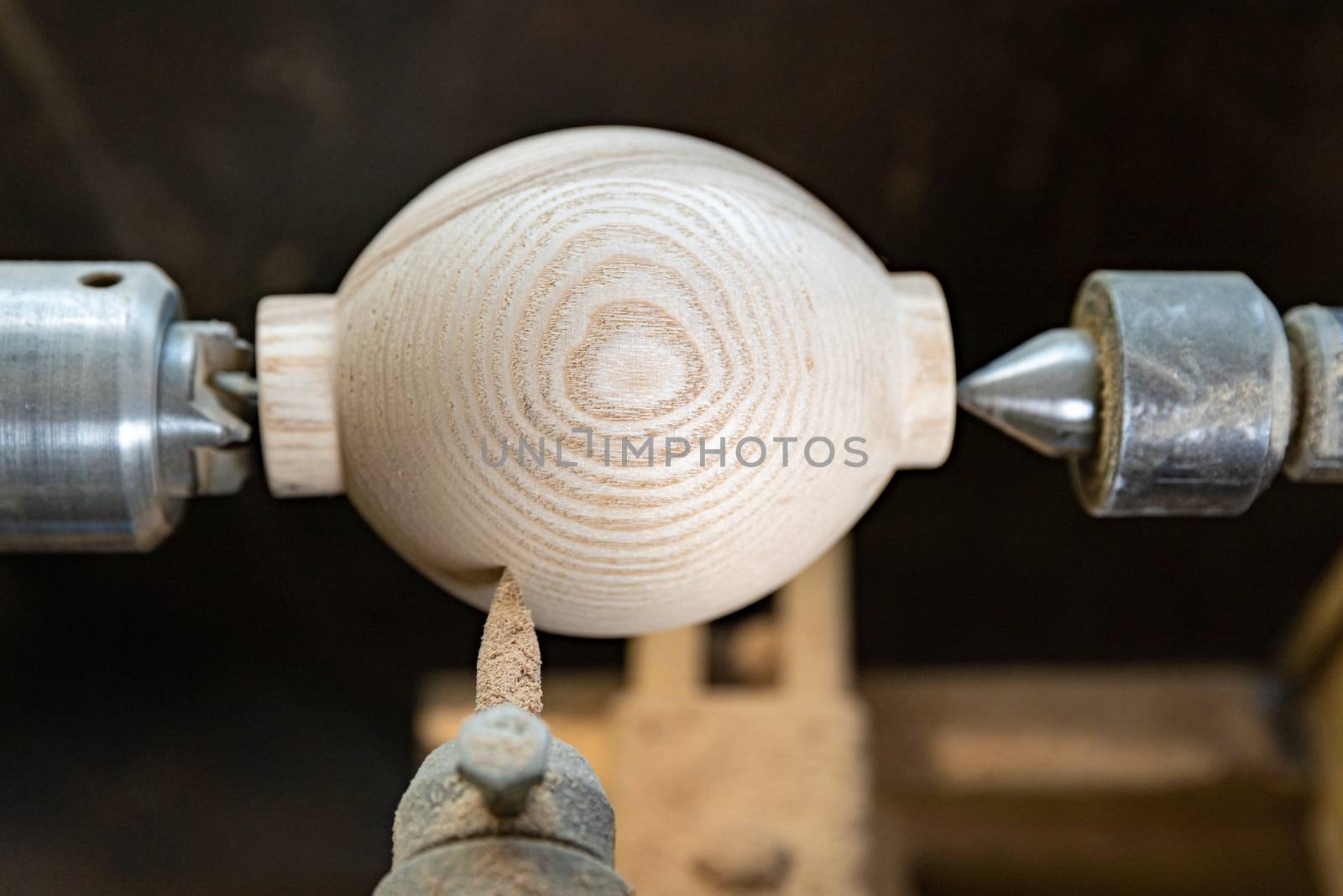 manufacture round wooden handles on lathe in joinery by Edophoto