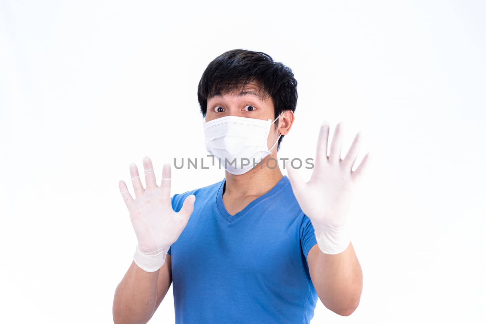 Asian young man in blue t-shirt top with medical mask and latex gloves to protect COVID-19 with isolated on white background concept.