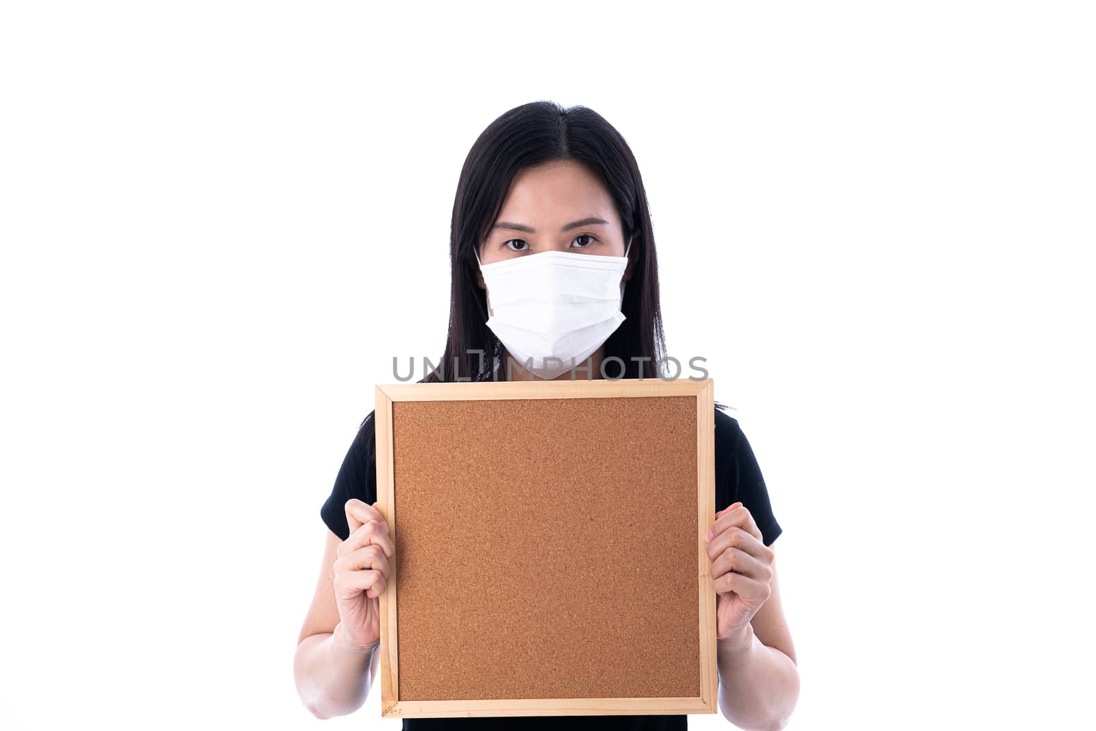 An Asian woman holding an empty board for writing COVID-19 prevention isolated on white background.