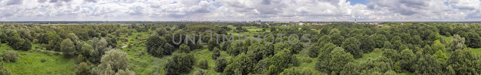 360 aerial panorama over Oude Landen nature park in Ekeren, with village and harbor in the distance. Travel and tourism