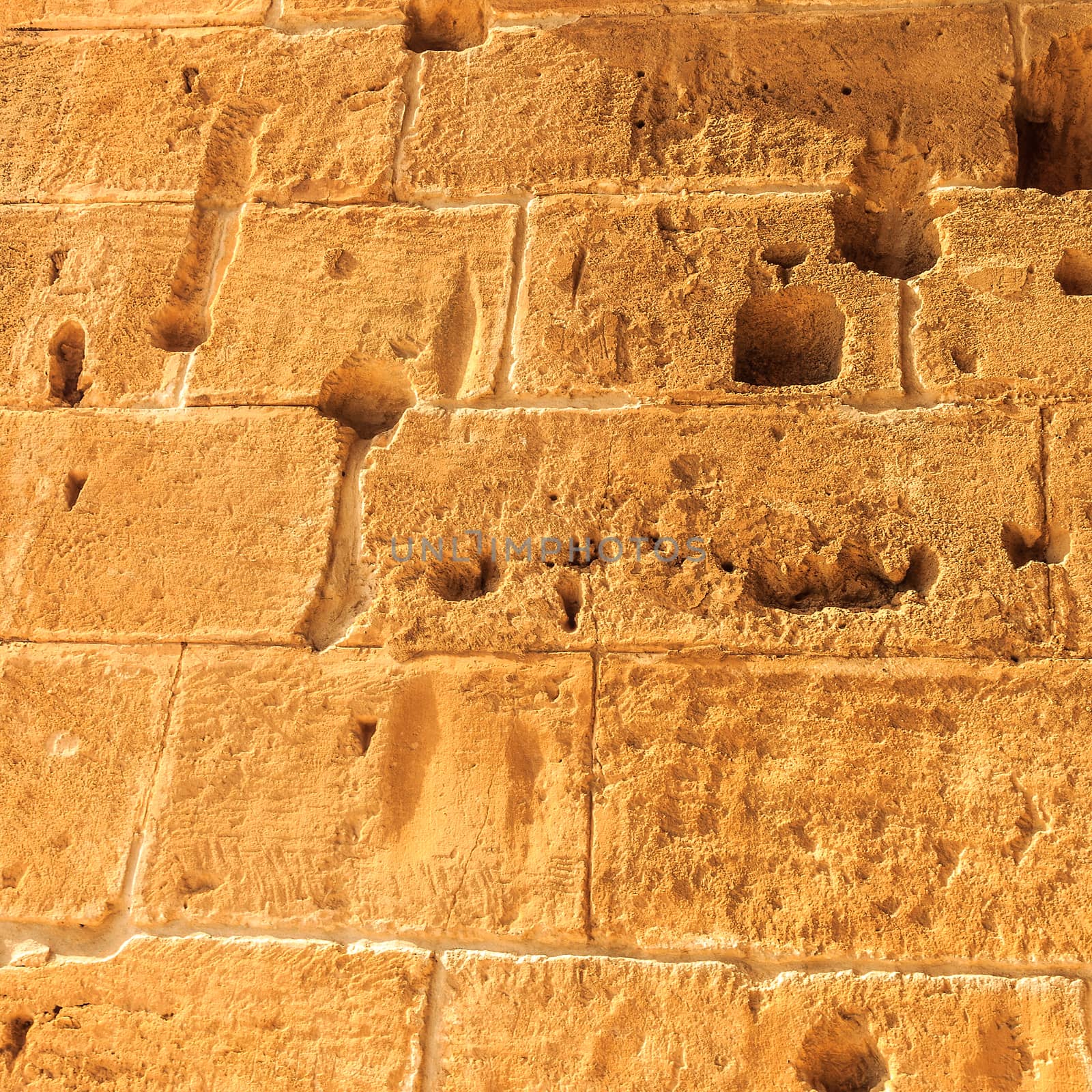 Background of ancient brick wall. Texture of old amphitheater stone for design.