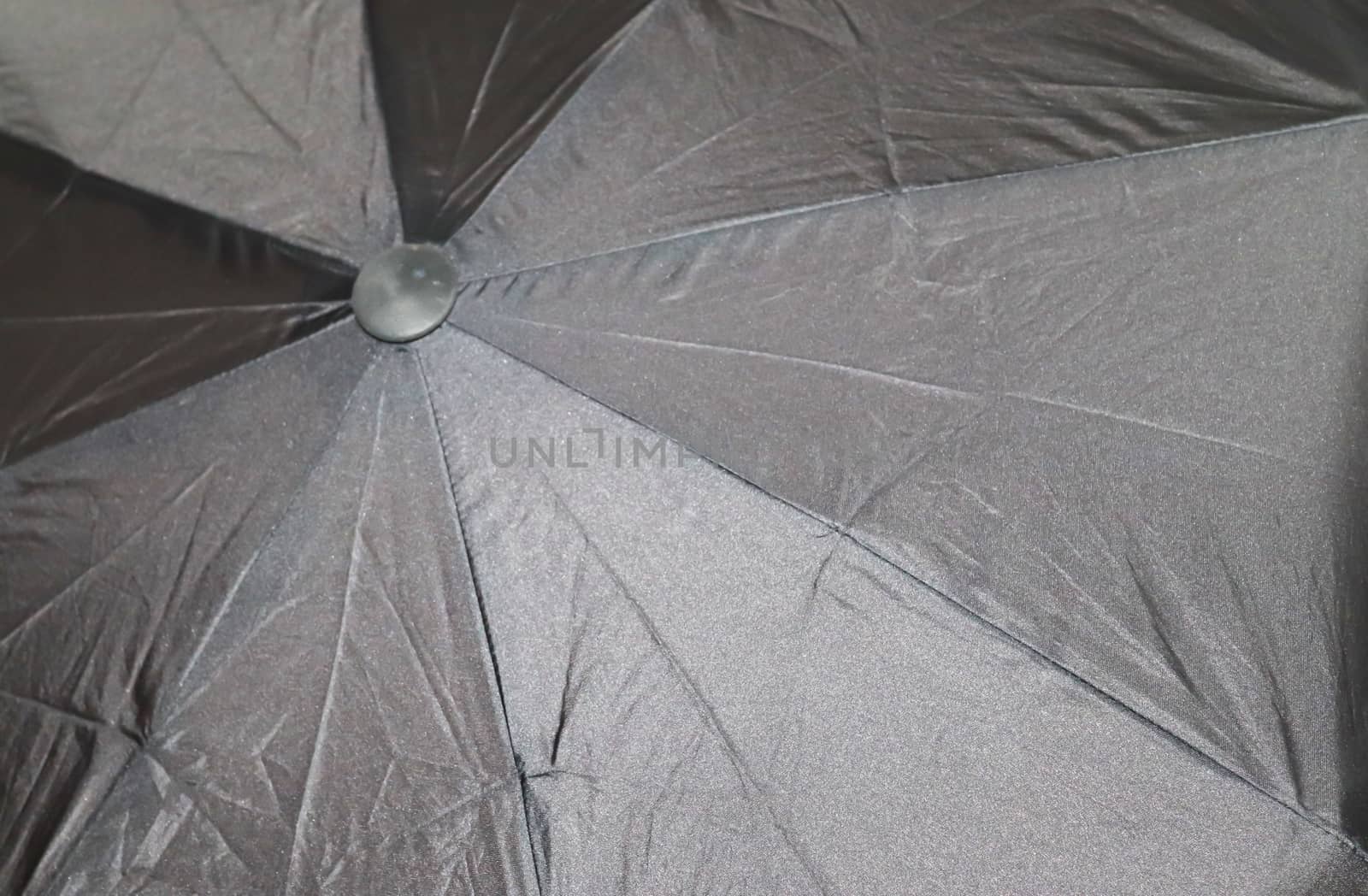 Close up view at the colorful surfaces of a rainproof umbrella by MP_foto71