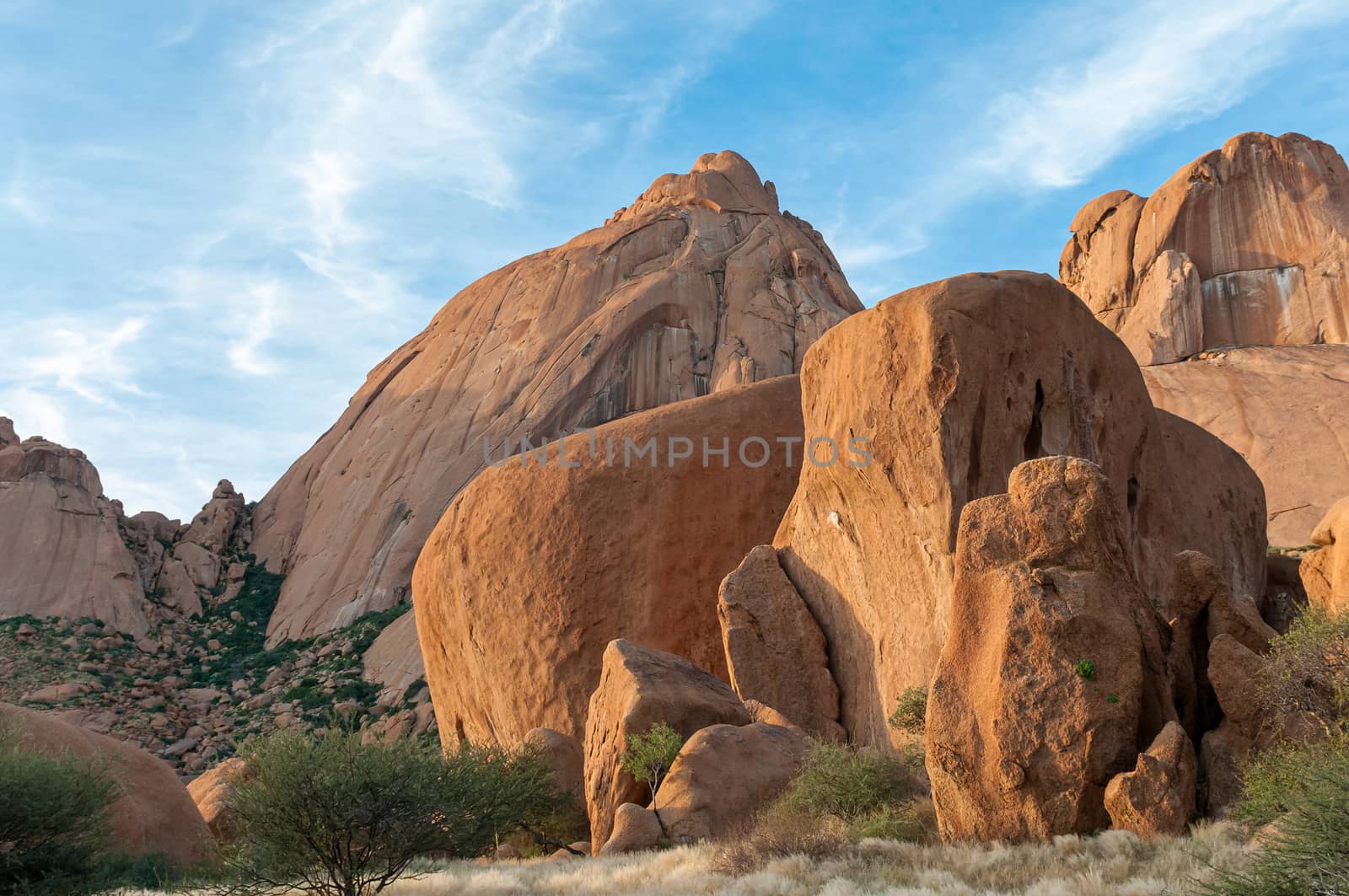 Granite boulders with the greater Spitzkop in the back by dpreezg