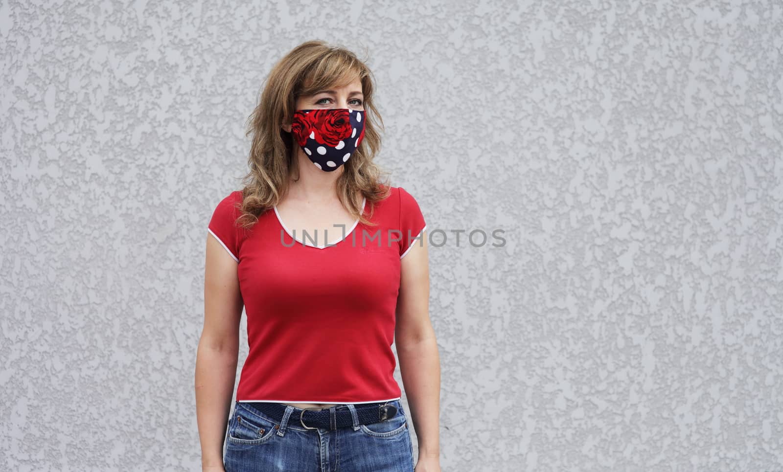 Girl in a protective mask against coronavirus by selinsmo
