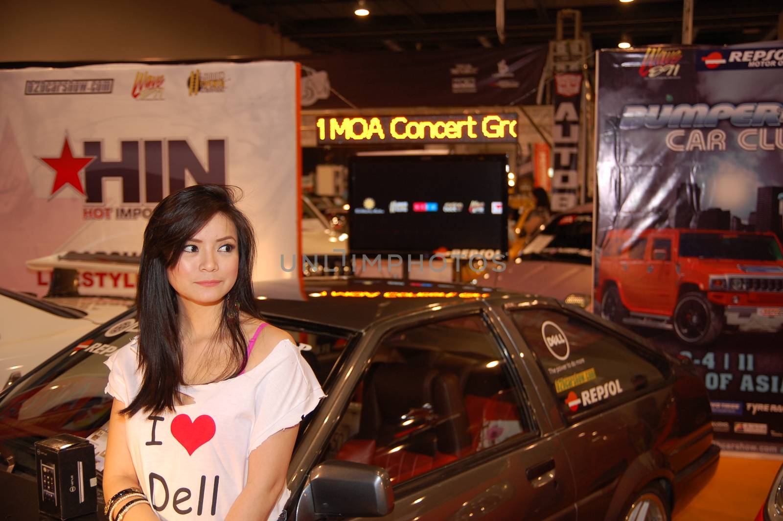 PASAY, PH - NOV 27: Car show female model at Manila Auto Salon on November 27, 2011 in SMX Convention Center, Pasay, Philippines.