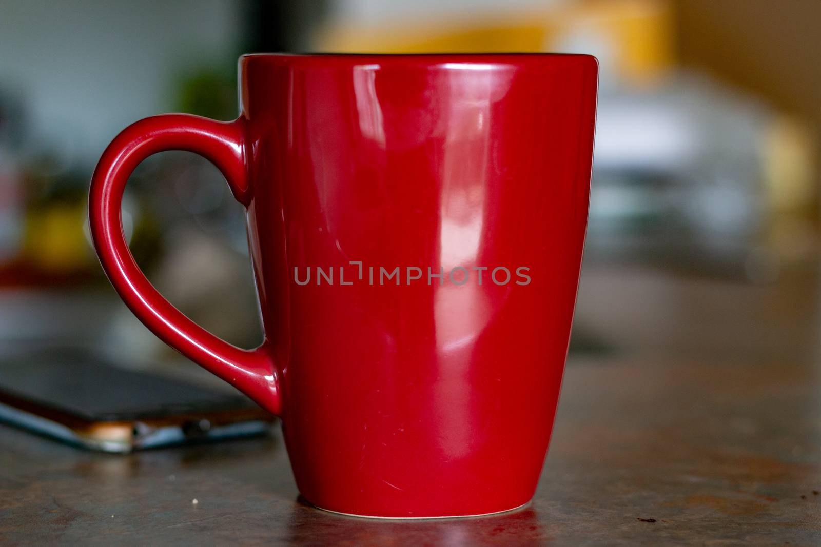 Old red coffee mug on a table with working supplies by mynewturtle1