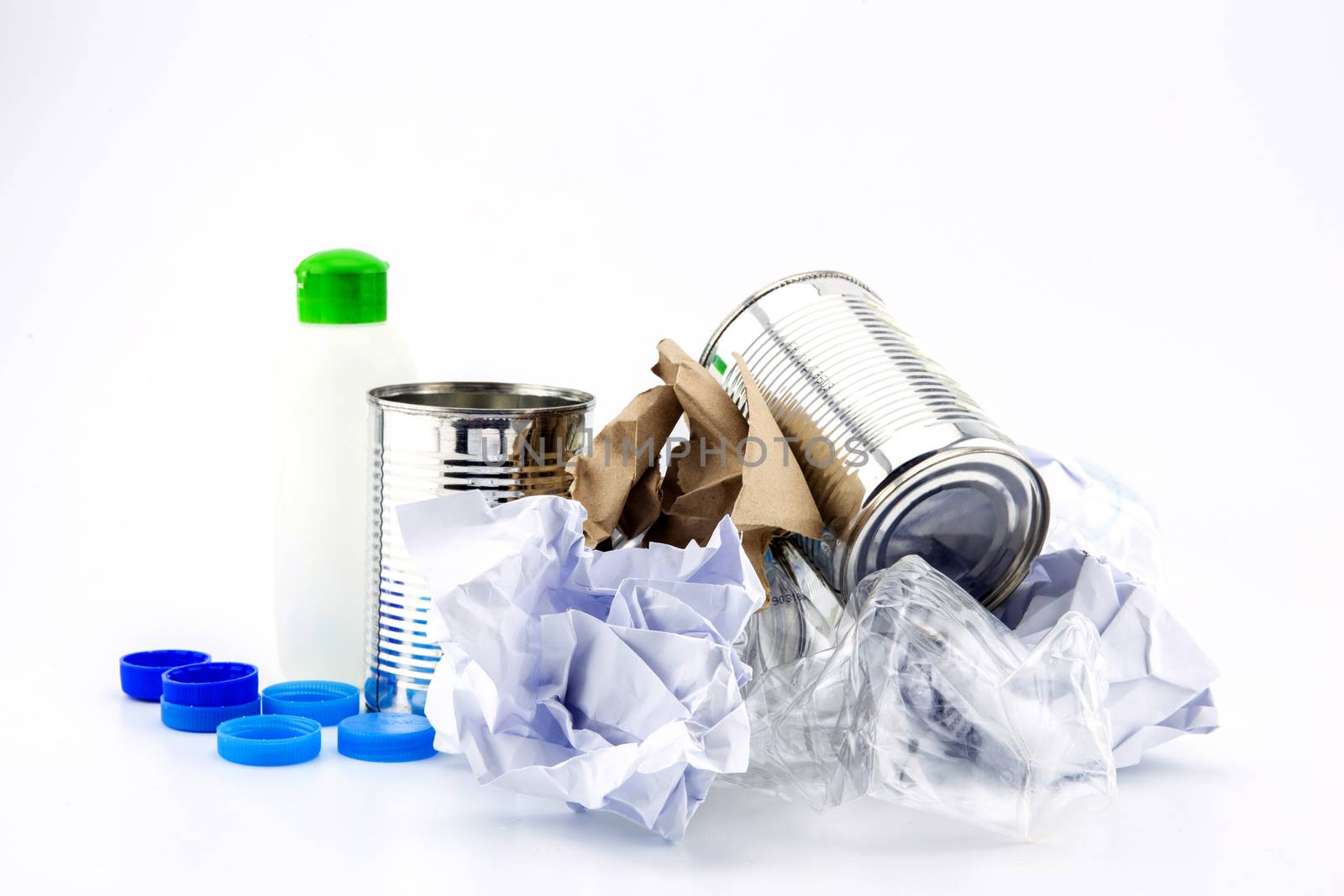 Heap of plastic garbage on white background.