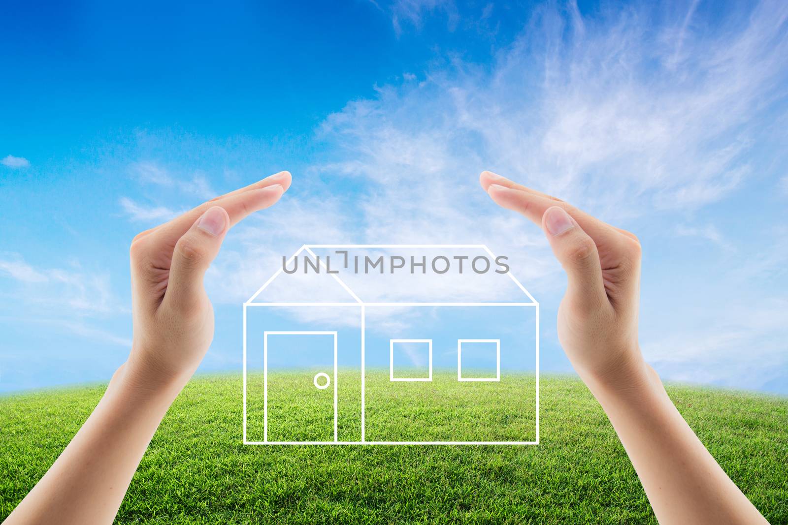 House sketch hand draw over blue sky with green field with hand.