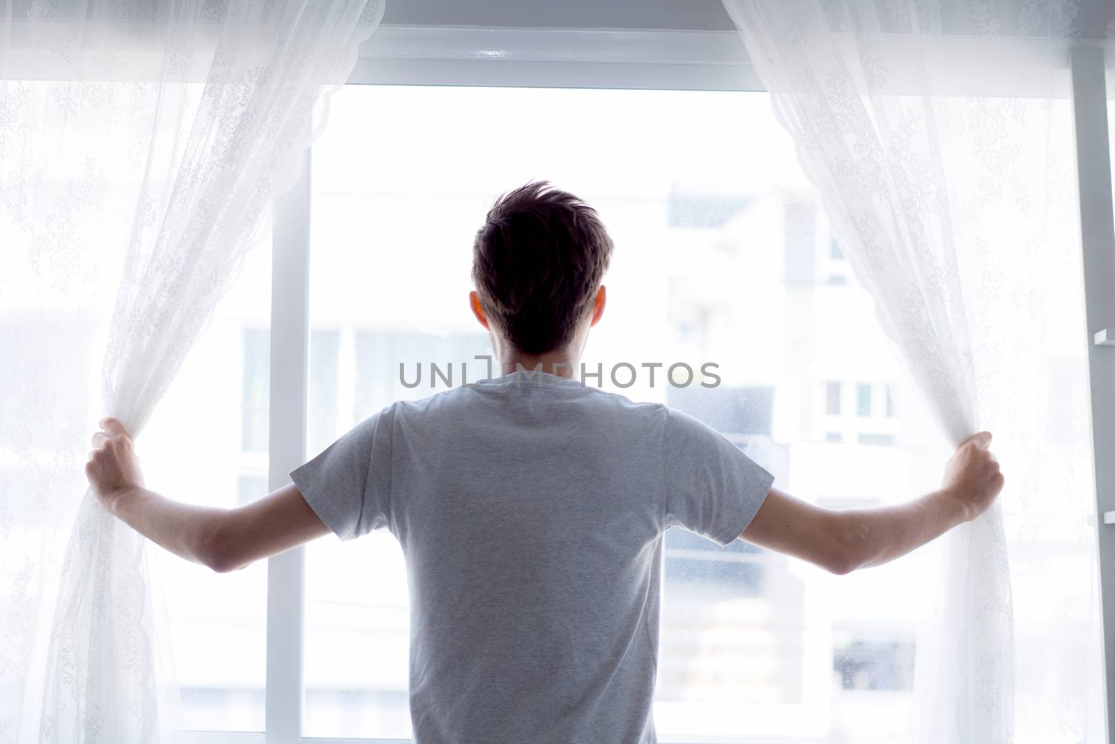 man and hope concept - man opening window curtains business concept.