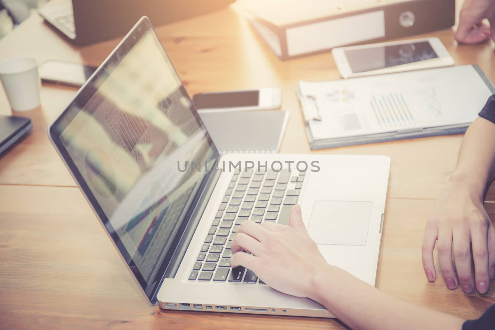 Closeup computer notebook in office with woman for work.