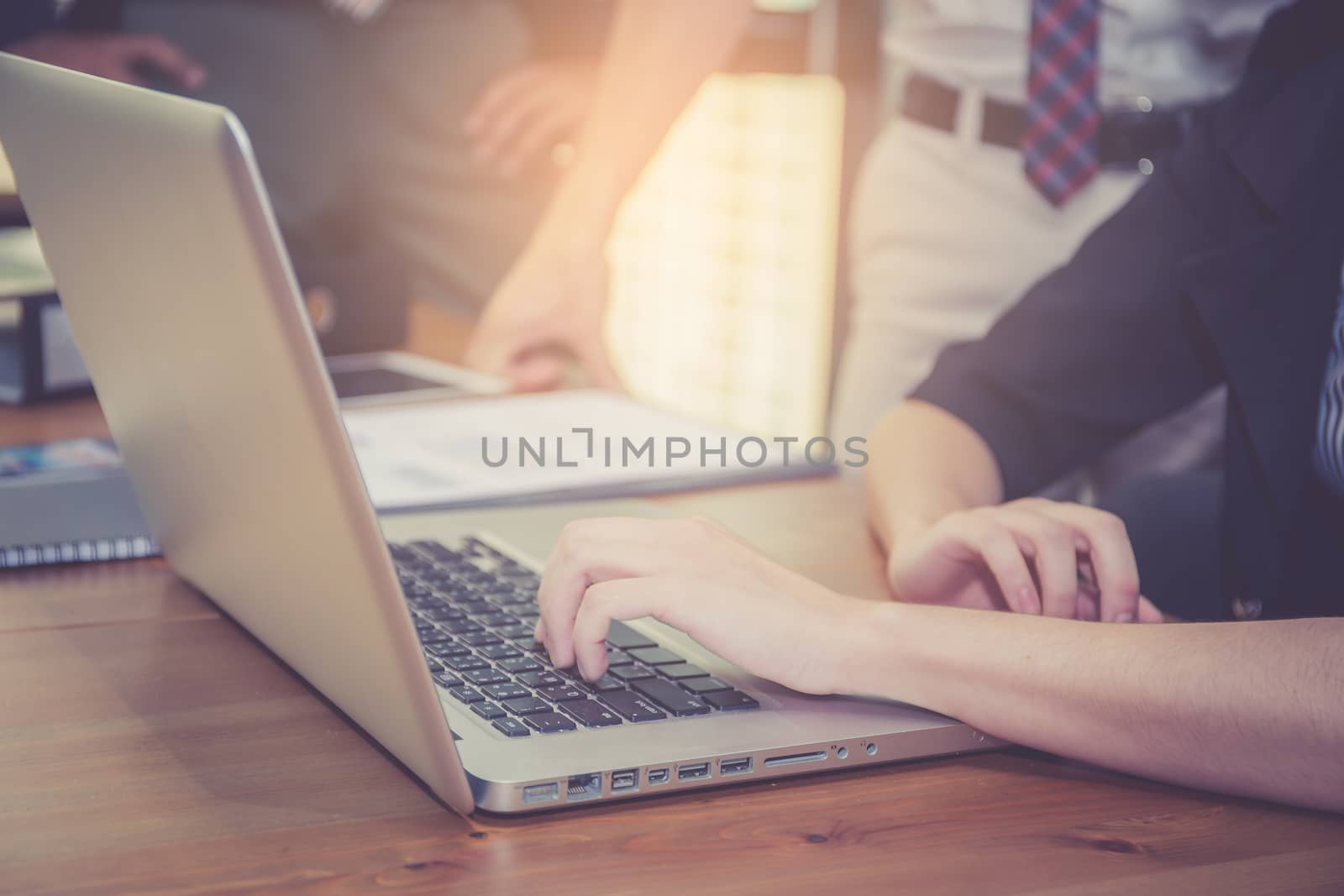Closeup computer notebook in office with woman for work.