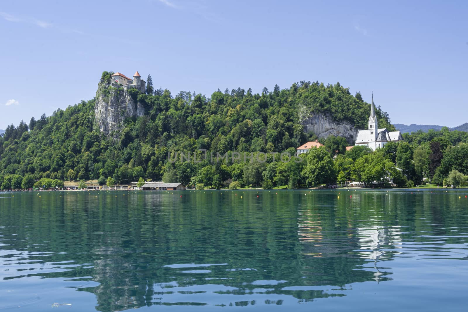 view of the lake with the castle in the background in Bled, Slovenia