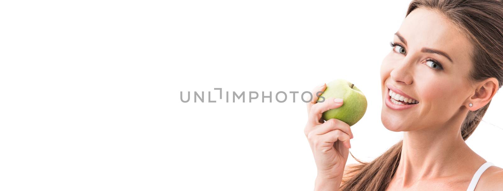 Woman eat green apple isolated on white background with copy space for text