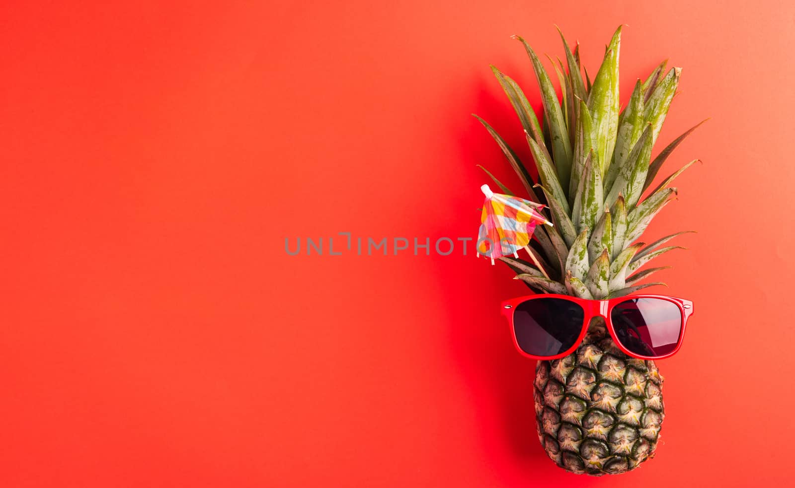 pineapple wear red sunglasses on red by Sorapop