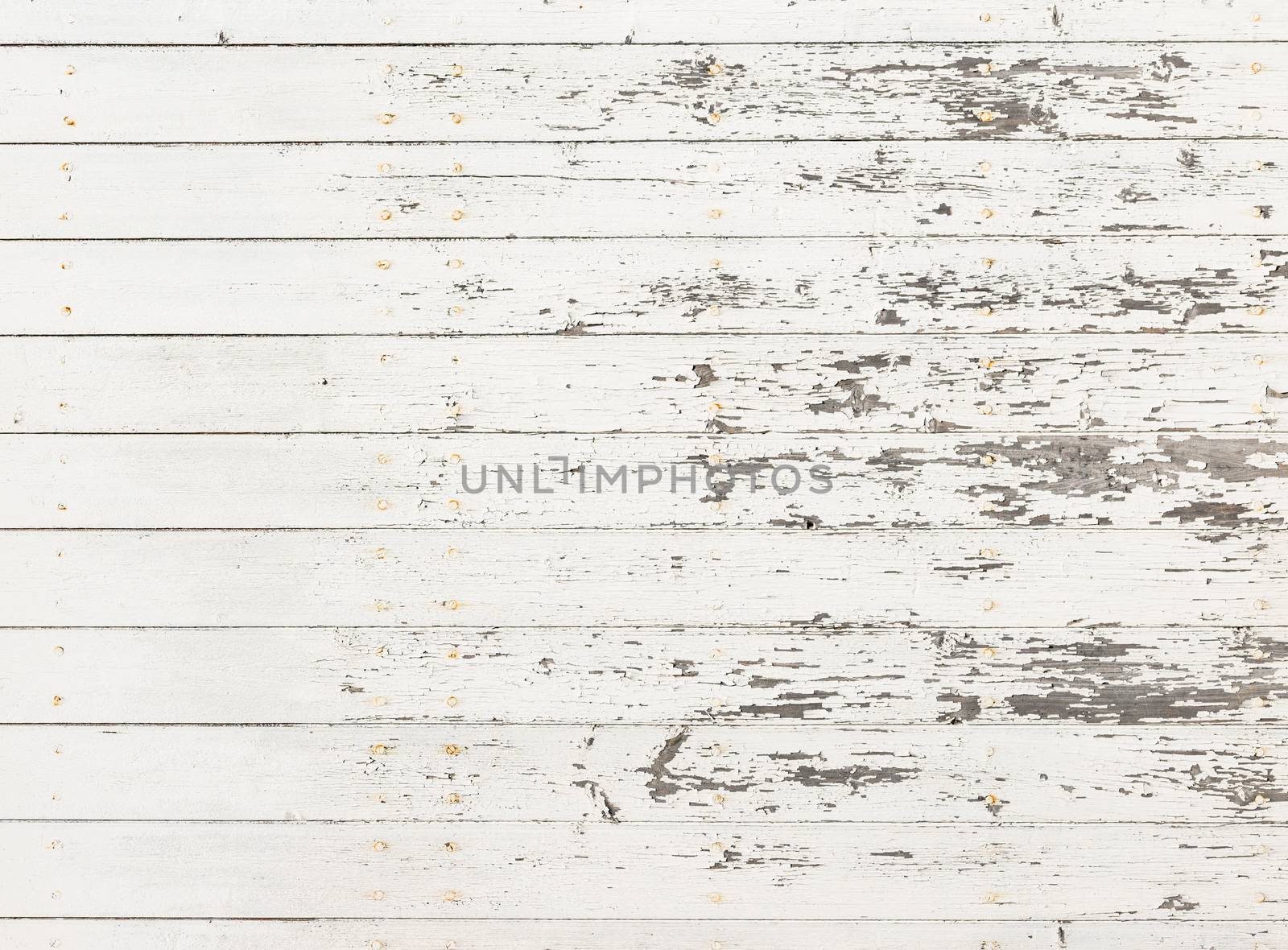 Old white weathered wood for background texture