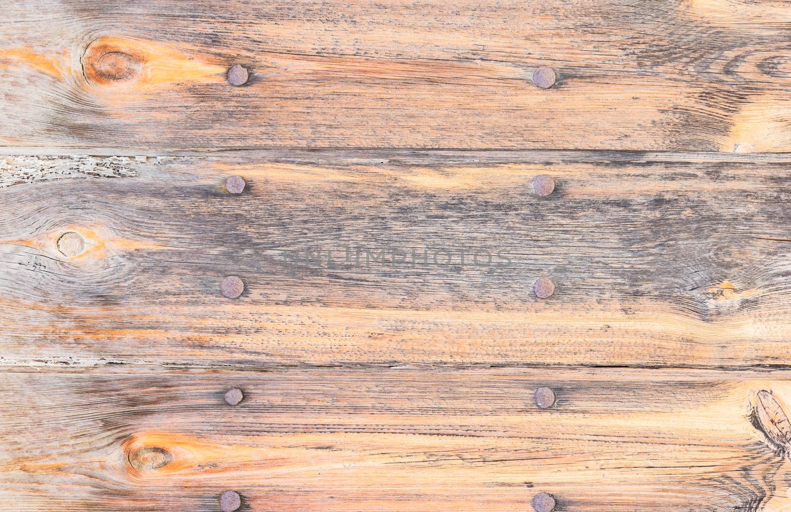 Age-old empty wooden boards backdrop texture with nails