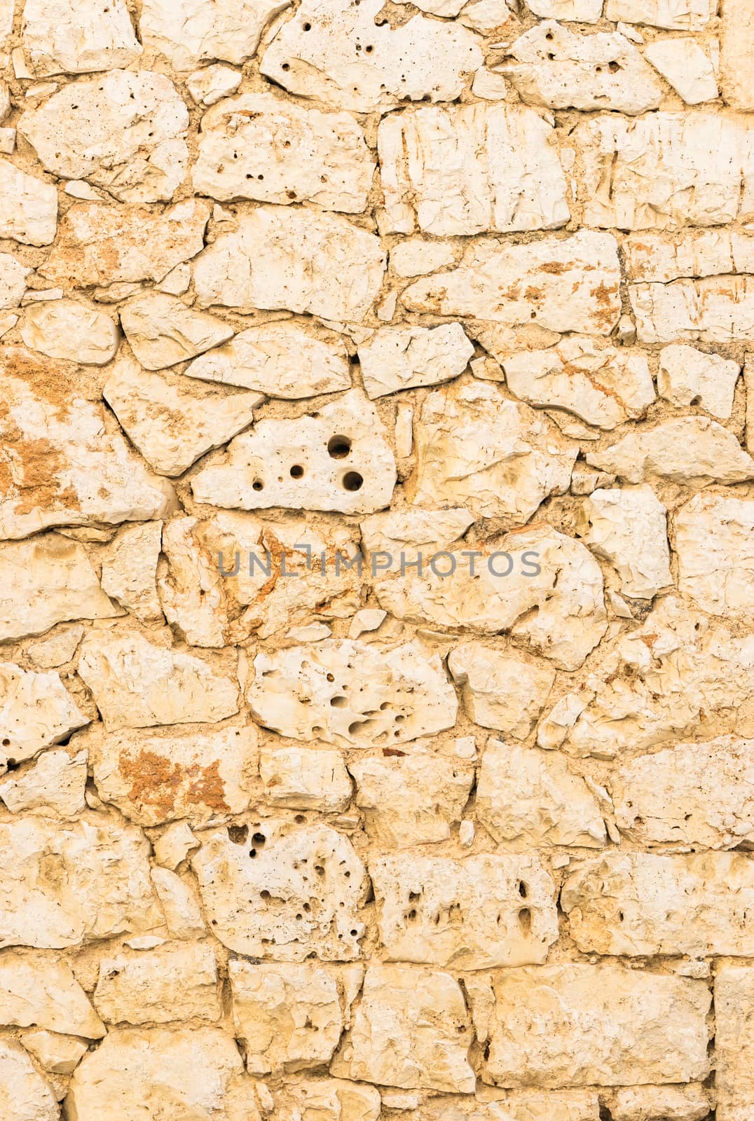 Rustic brown stone wall texture background structure