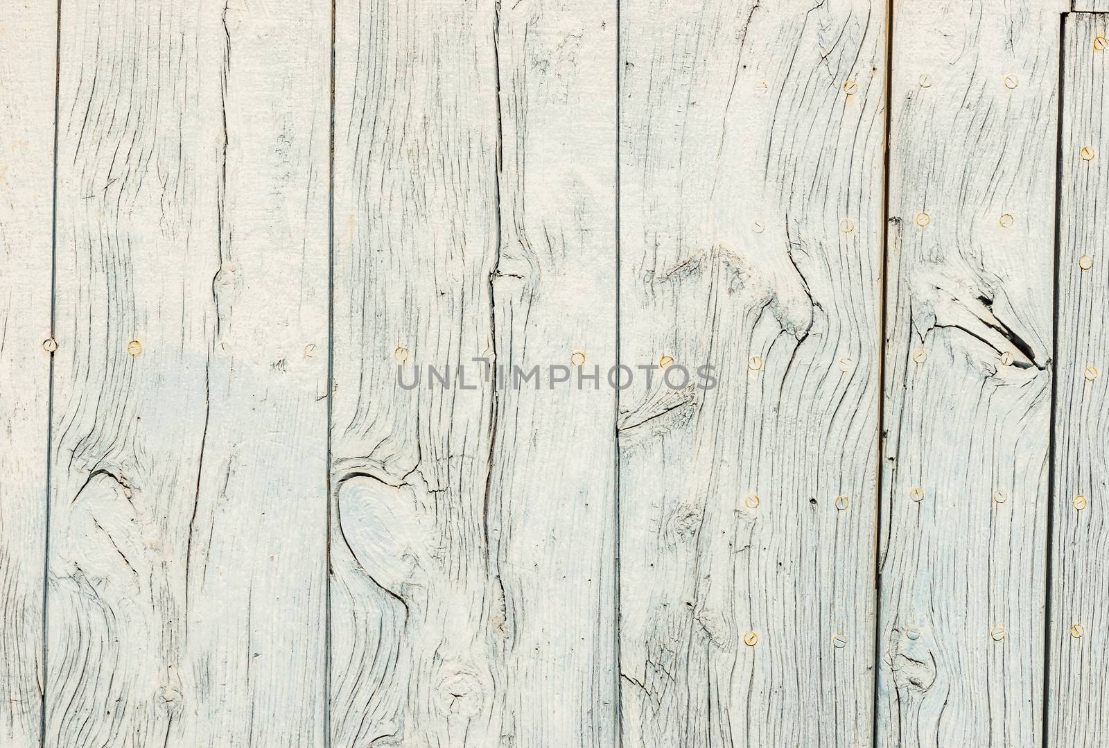 Empty wooden light gray boards backdrop texture with copy space