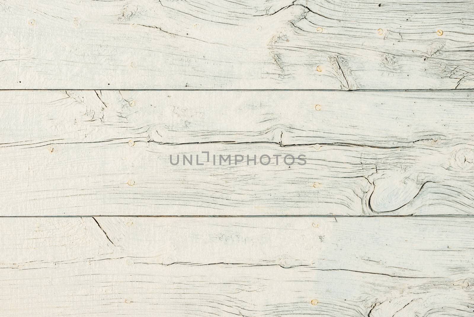 Light gray white wooden planks background texture close-up with copy space