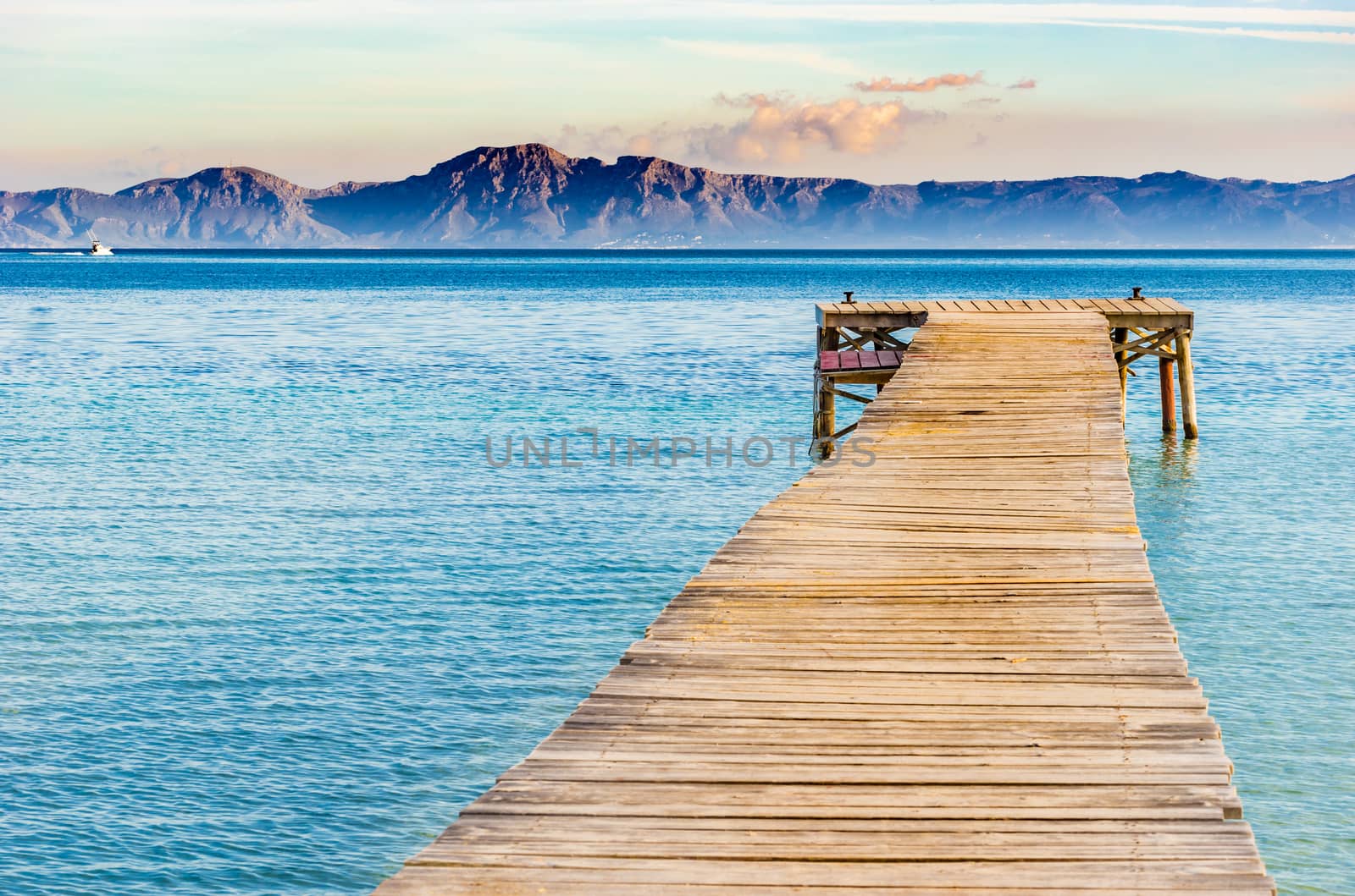 Jetty at the bay of Alcudia on Mallorca island, Spain Mediterranean Sea