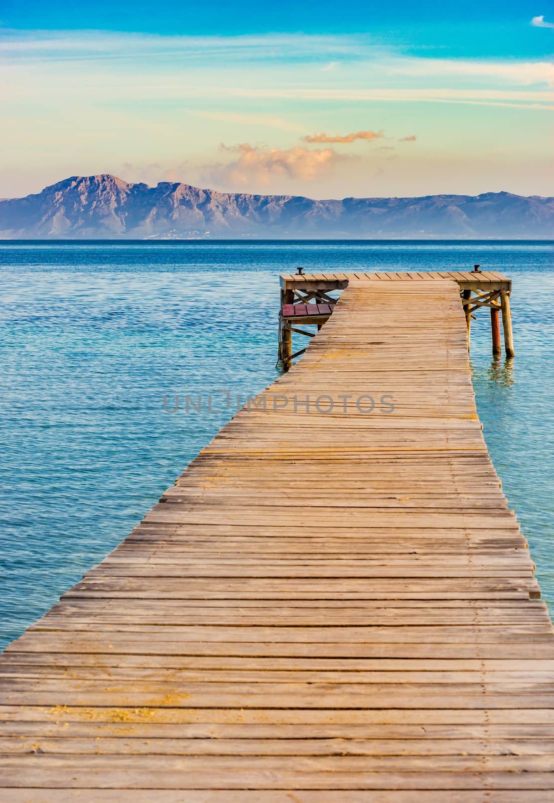 Beautiful view of the jetty at the bay of Alcudia on Majorca, Spain Balearic islands