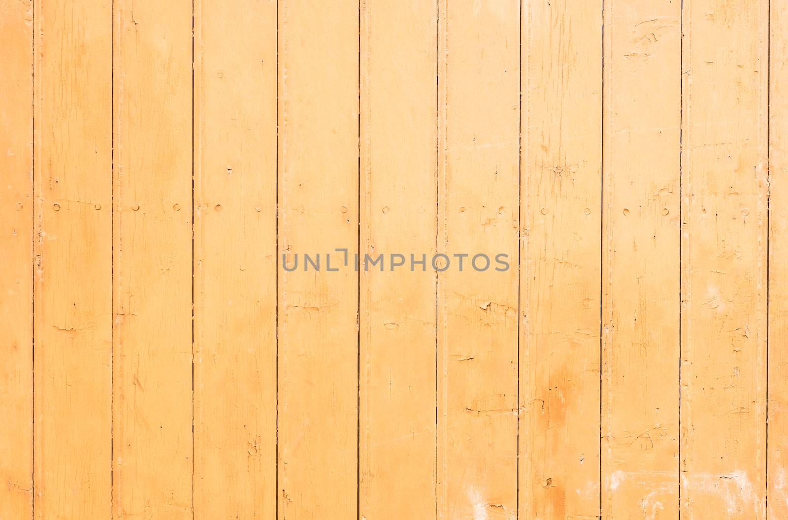 Light brown wooden wall background texture, surface close-up
