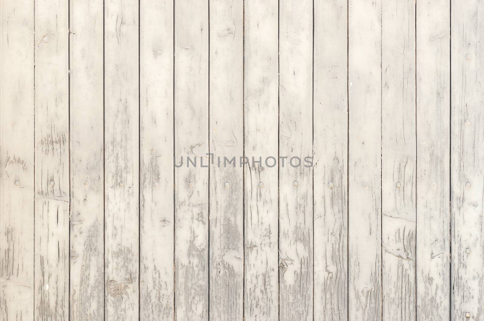 Old white painted wooden wall for background texture