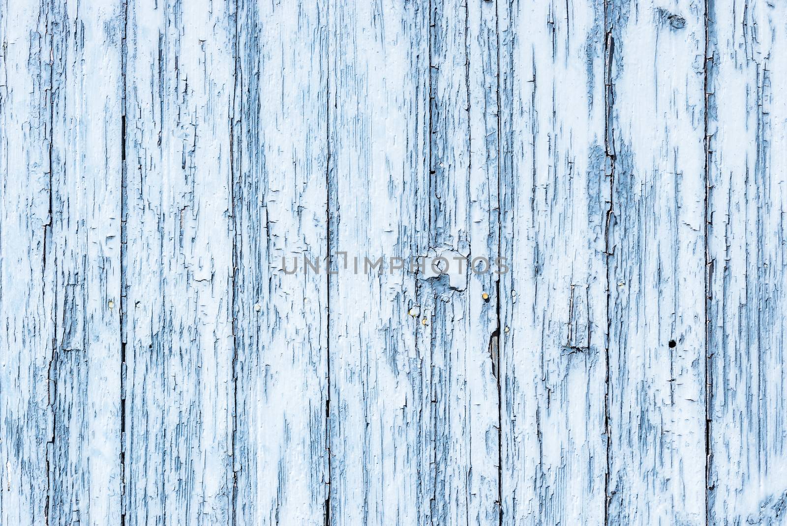 Background texture of blue gray wooden wall with peeling paint