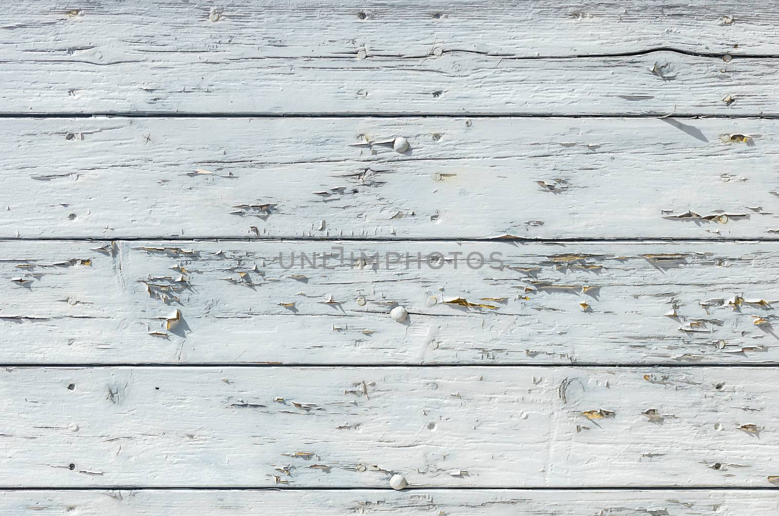 Old white wooden planks for background texture