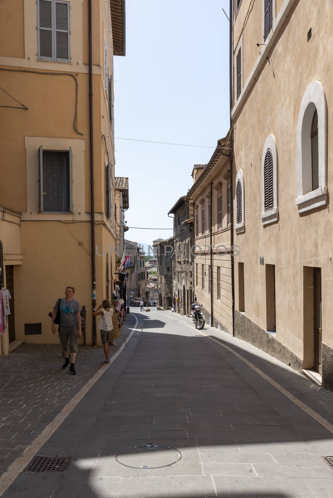 assisi,italy july 11 2020 :architecture of streets and buildings in the historic center of assisi