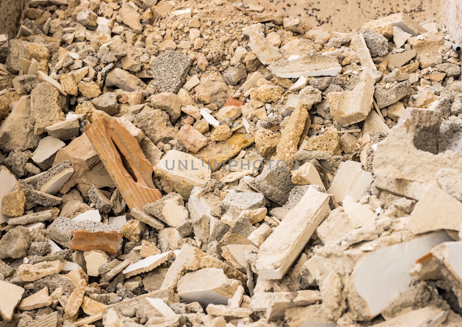 Stack of building rubble, construction industry background texture