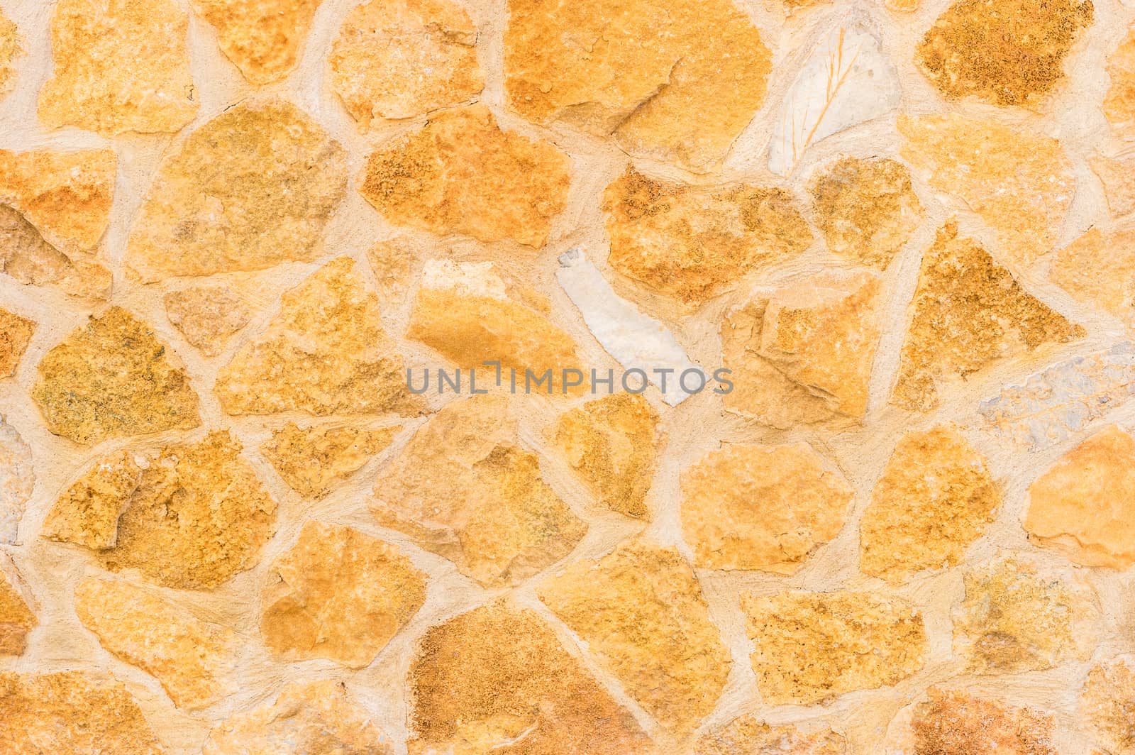 Natural stone wall background structure, close up