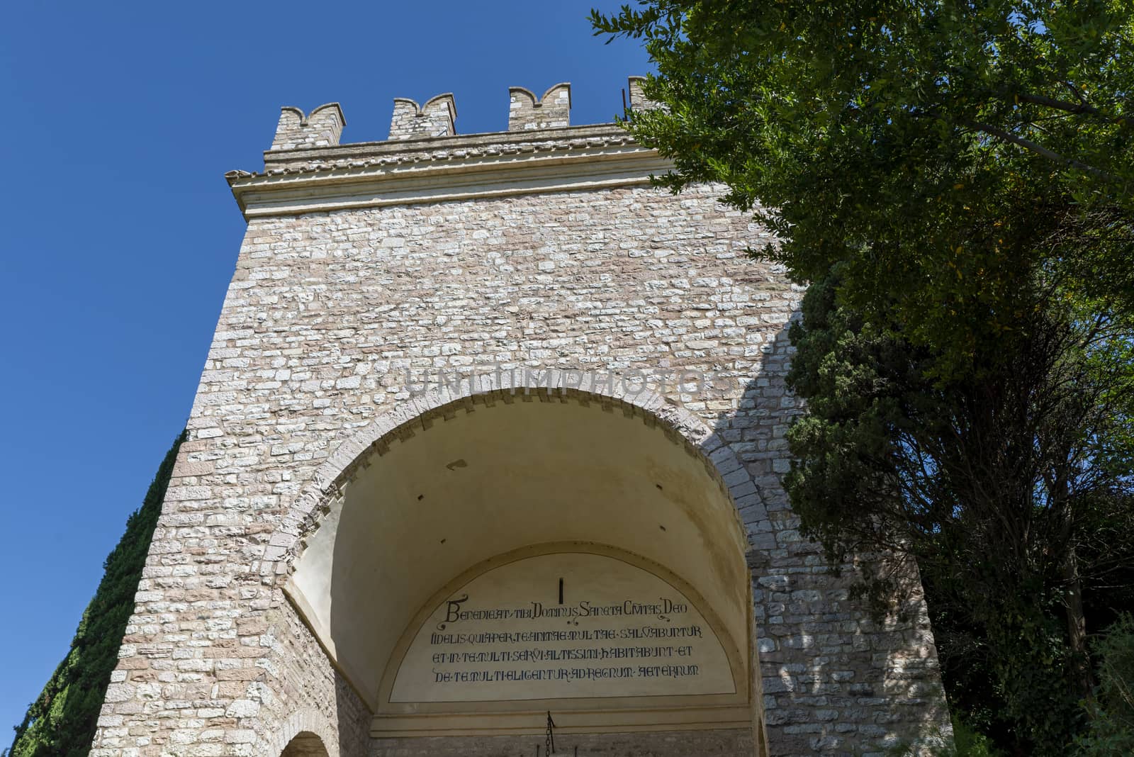 assisi,italy july 11 2020 :new entrance door to the town of assisi