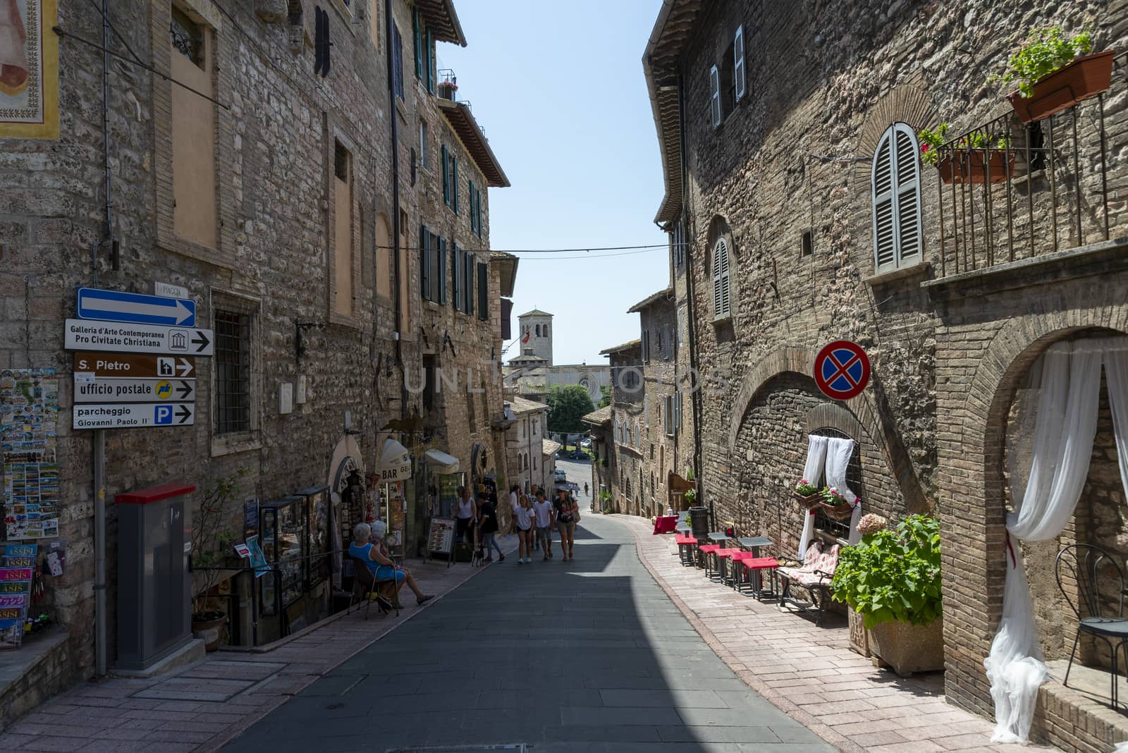 assisi,italy july 11 2020 :architecture of streets and buildings in the historic center of assisi