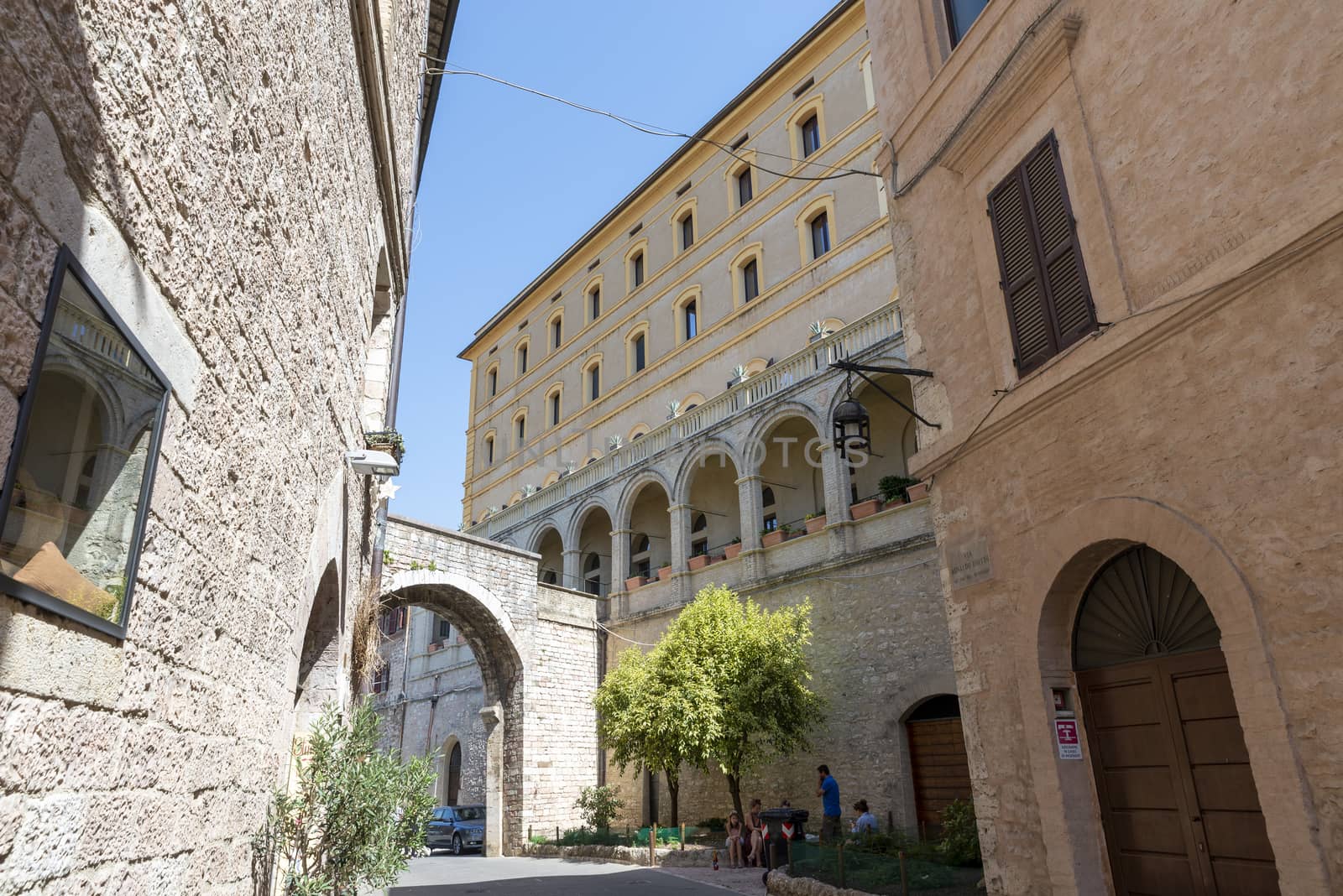 assisi,italy july 11 2020 :architecture of streets and buildings in the historic center of assisi