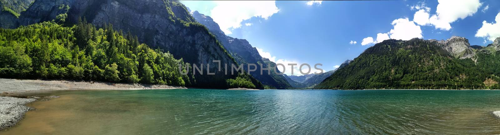 Swiss mountains and Lake. Scenic Alps and lane view. Trekking and outdoor lifestyle