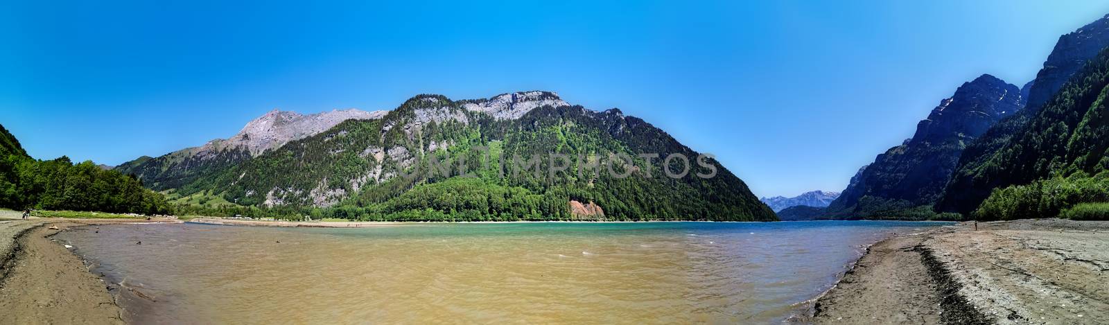 Swiss mountains and Lake. Scenic Alps and lane view. Trekking and outdoor lifestyle