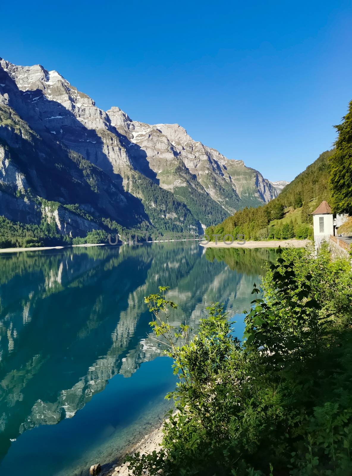 Swiss mountains and Lake. Scenic Alps and lane view. Trekking an by PeterHofstetter