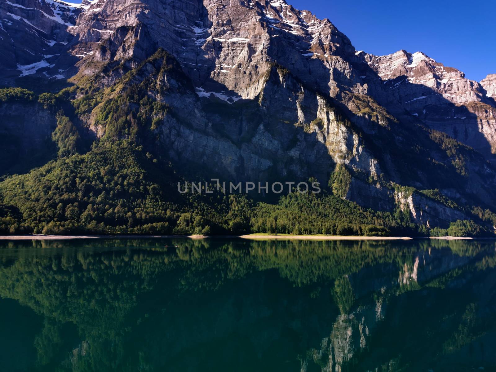 Swiss mountains and Lake. Scenic Alps and lane view. Trekking an by PeterHofstetter