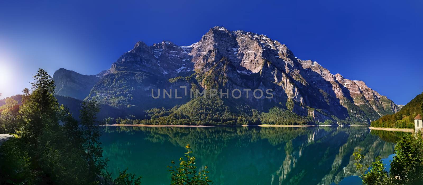 Swiss mountains and Lake. Scenic Alps and lane view. Trekking an by PeterHofstetter