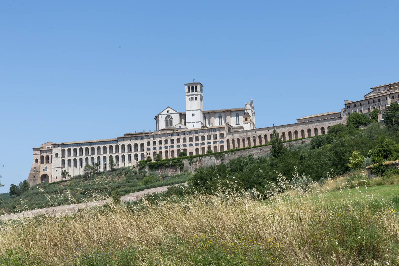 assisi,italy july 11 2020 :landscape of assisi seen from outside the country