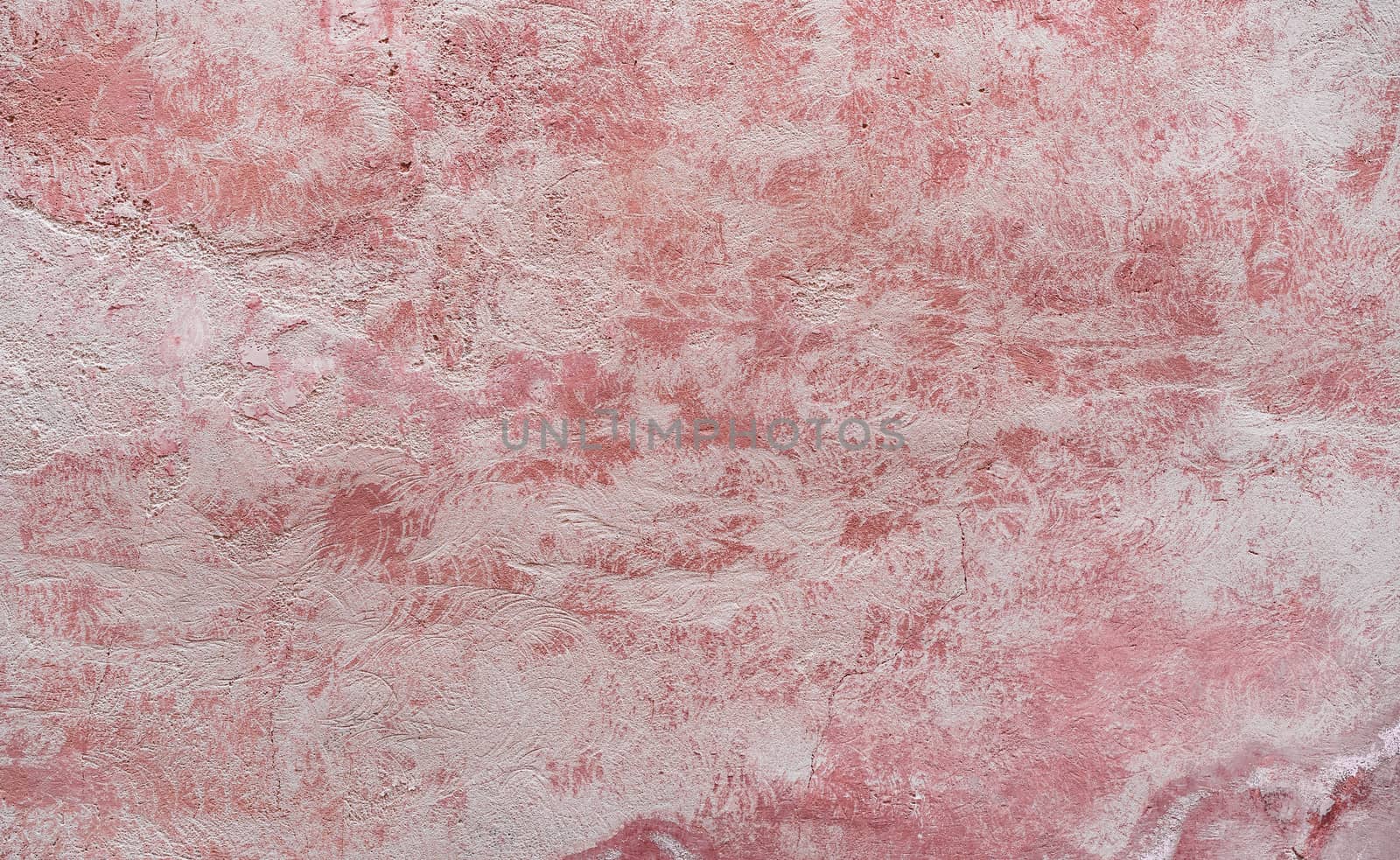 Vintage colored wall background with rustic weathered plaster texture 