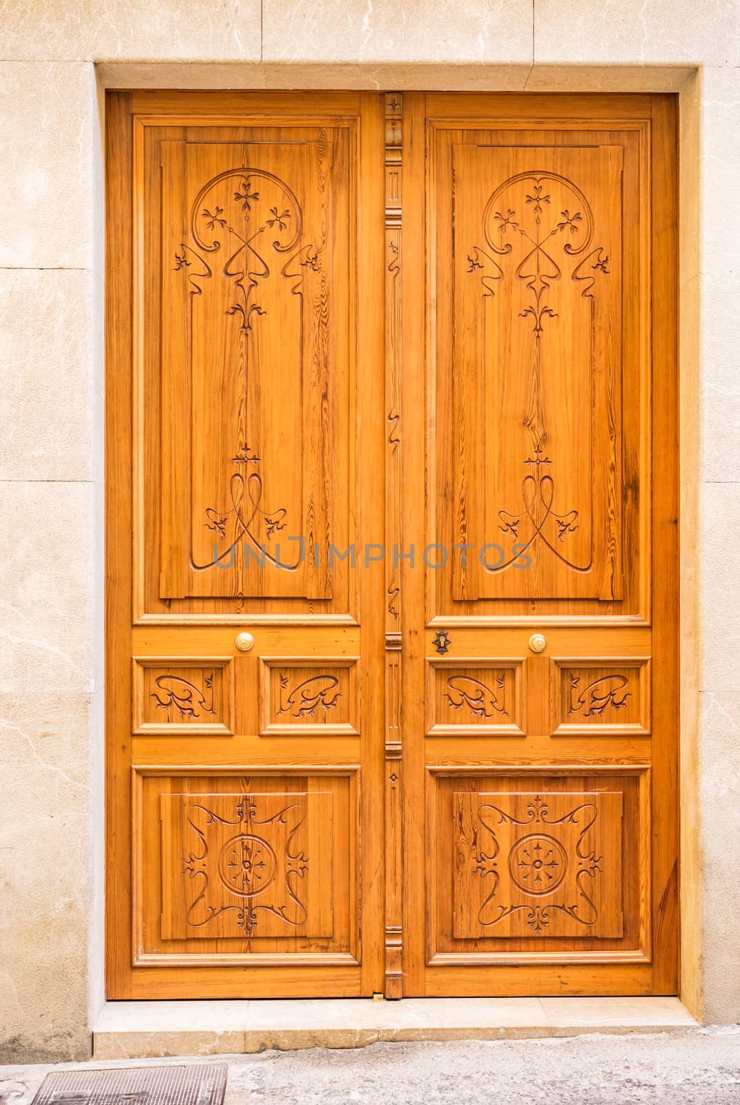 Closed wooden front door of residence entrance