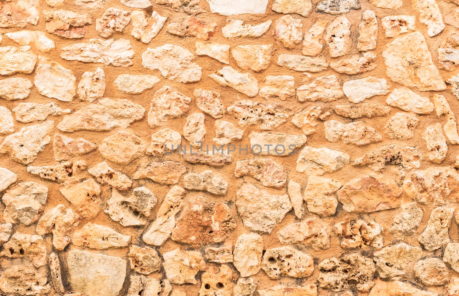 Vintage grunge stone wall background texture, close-up

